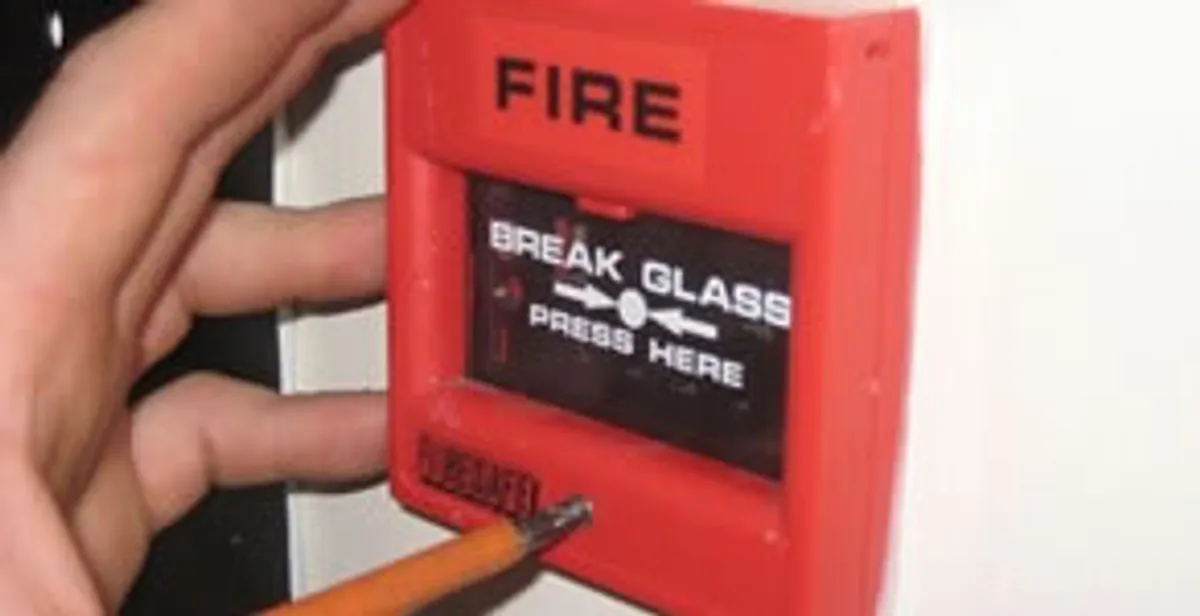 fire alarm installation service showing manual fire alarm pull station installed by licensed electricians in Fresno, CA