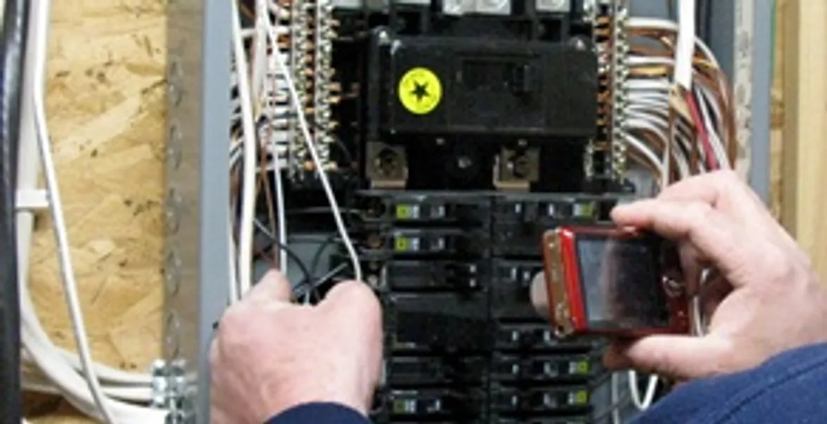 Home electrical inspection of circuit breaker panel by licensed electrician in Fresno, CA